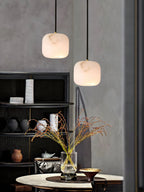 Modern Alabaster Pendant Lights in Open Dining Area