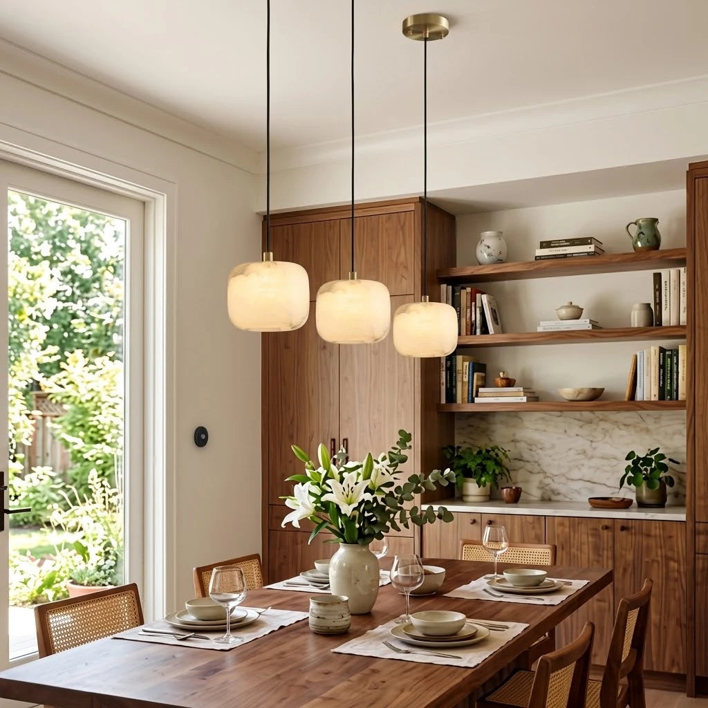 Modern Soft Rounded Alabaster Pendant Lights Over Dining Table