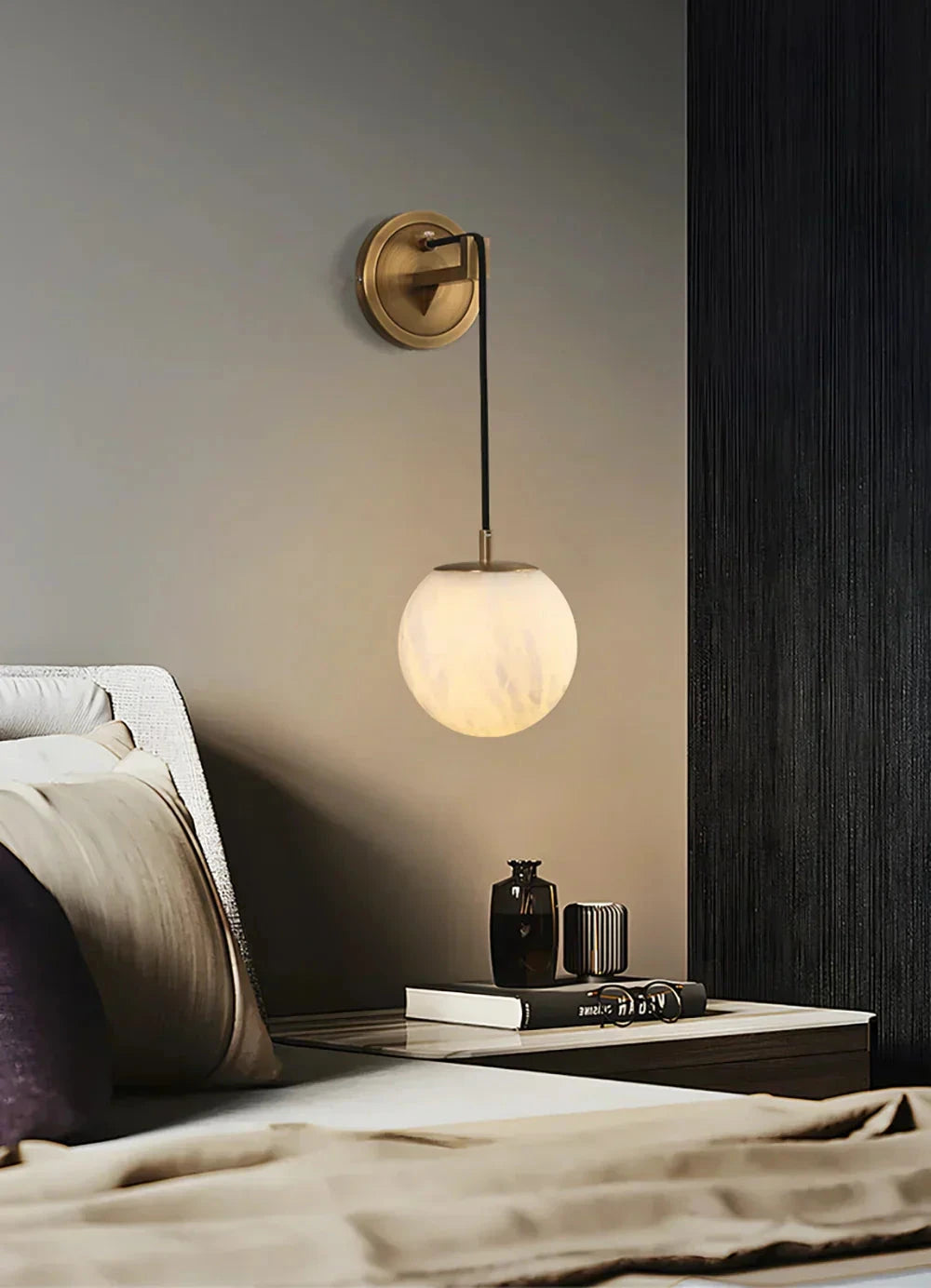 Brass Alabaster Globe Sconce in Contemporary Bedroom Nook