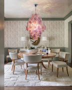 Modern Pink Disc Art Glass Chandelier Over Round Dining Table