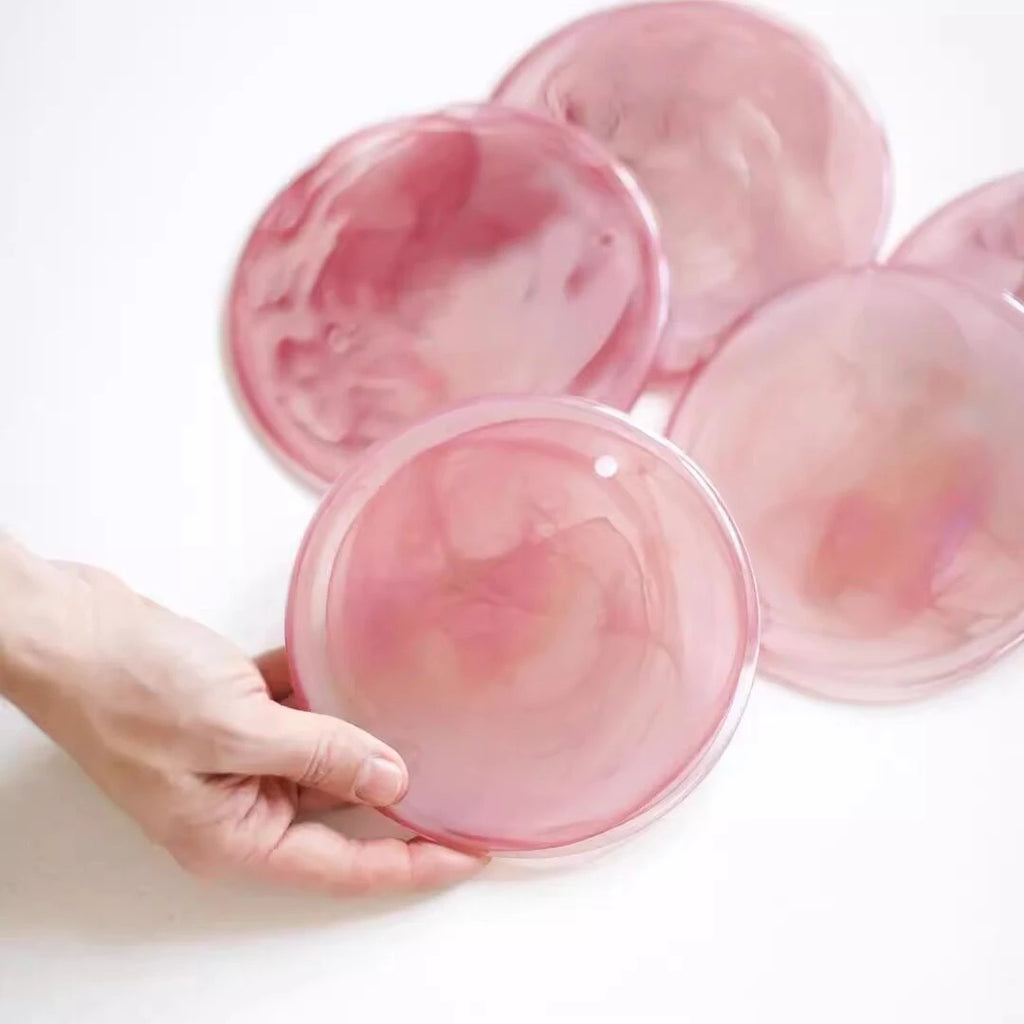 Close Up View of Handcrafted Pink Disc Art Glass Elements