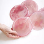 Close Up View of Handcrafted Pink Disc Art Glass Elements