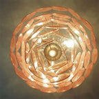 Top View of Illuminated Modern Pink Disc Art Glass Chandelier
