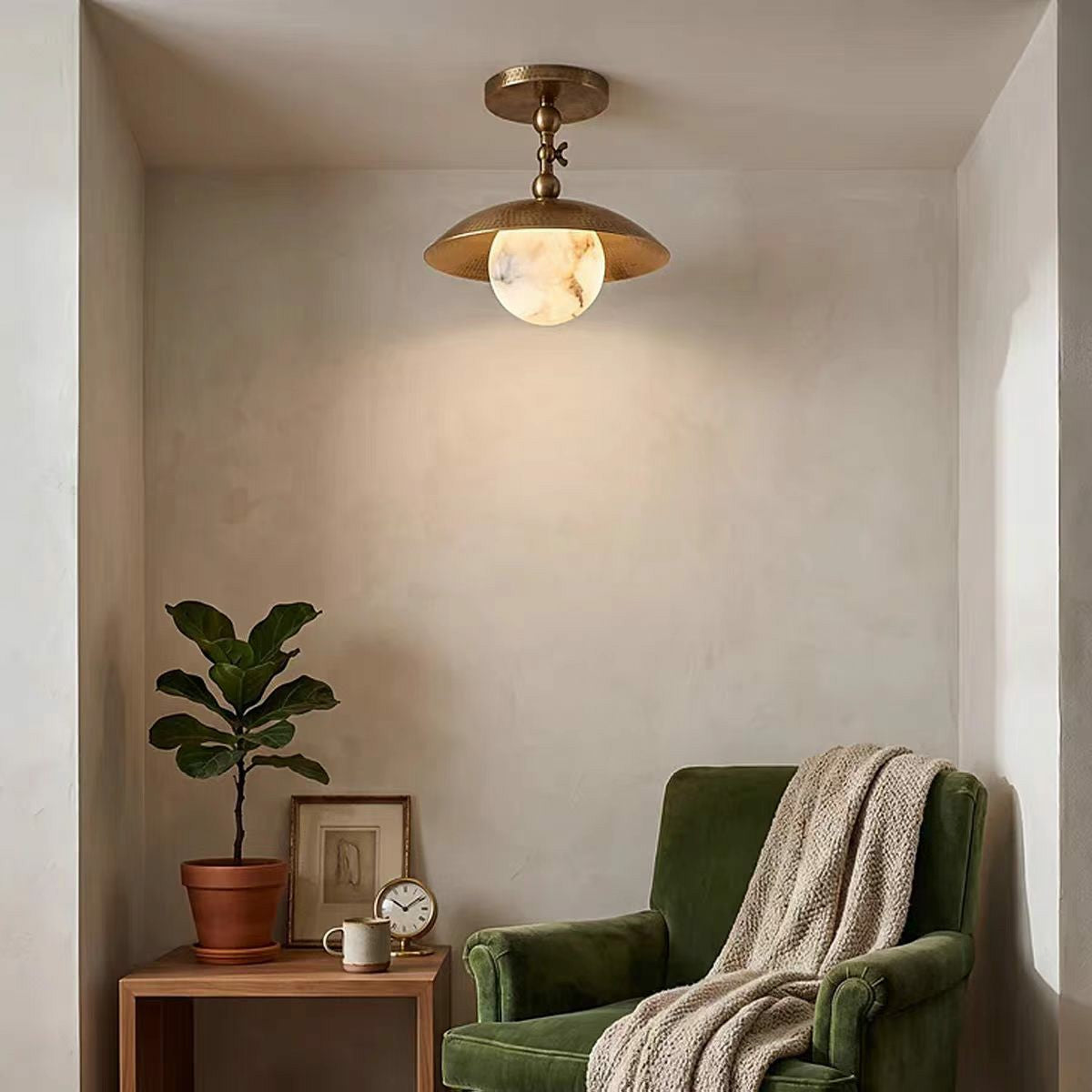 Brass Globe Ceiling Lamp Illuminating Cozy Reading Nook