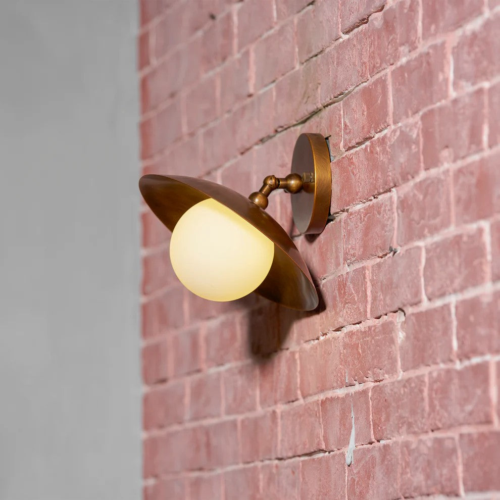 Brass Dish Shade Wall Sconce Mounted on Red Brick Wall