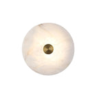 Modern Alabaster Disc Art Wall Sconce with Brass Center on Pure White Background