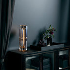 Illuminated Modern Crystal Column Table Lamp in Evening Interior