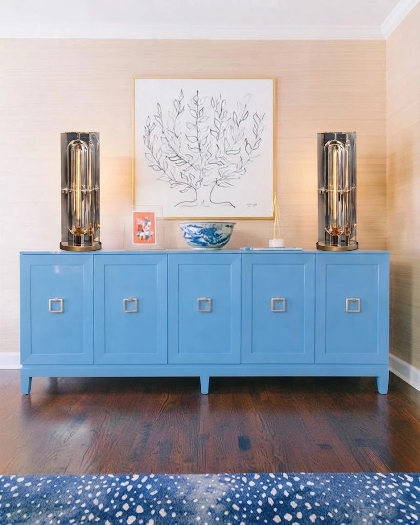 Symmetrical Prism Crystal Column Table Lamps on Blue Credenza