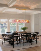 Modern Pink Gradient Colorful Disc Art Glass Linear Chandelier in Elegant Dining Room