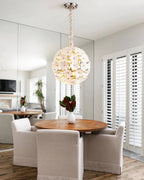Modern Brass White Hydrangea Globe Pendant Light Over Round Dining Table