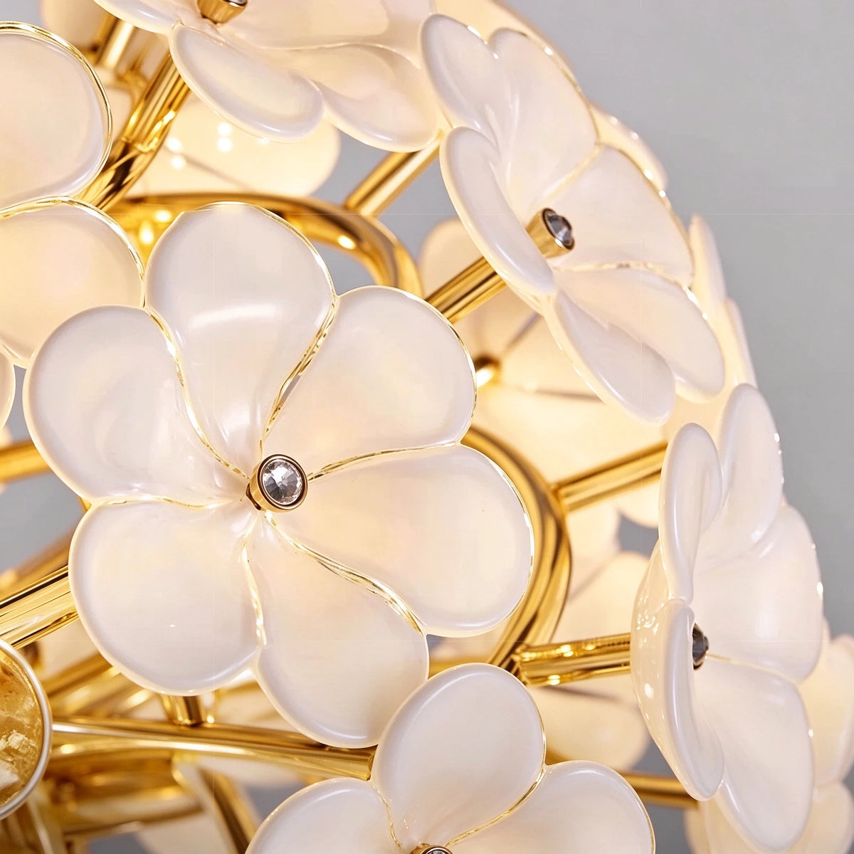 Close Up View of Illuminated White Hydrangea Petal Art Glass and Globe Structure