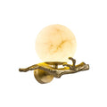 Modern Alabaster Sphere Wall Sconce with Brass Tree Branch Base on White Background
