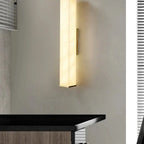 Modern Alabaster Bar Sconce Over Living Room Side Table