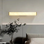 Modern Horizontal Alabaster Sconce Over Bed Headboard
