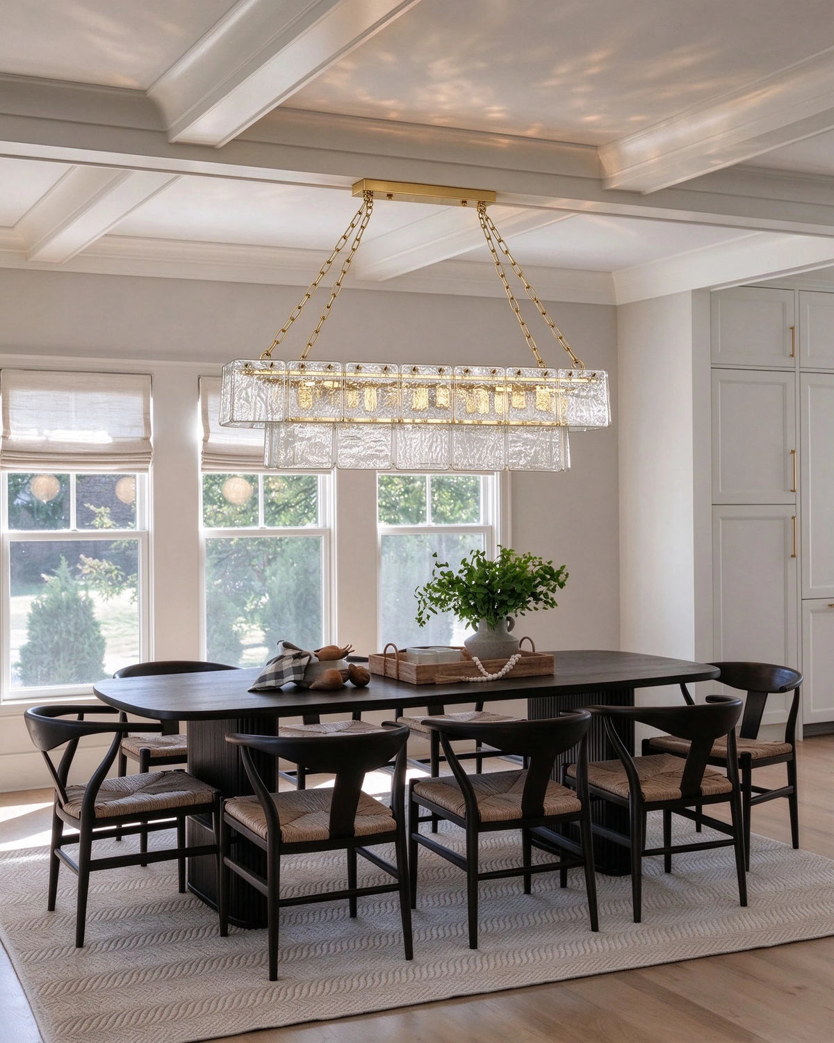 Modern Dark Dining Room Installation Shot of Linear Glass Chandelier