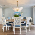 Modern Tiered Art Glass Chandelier Over Round Dining Table