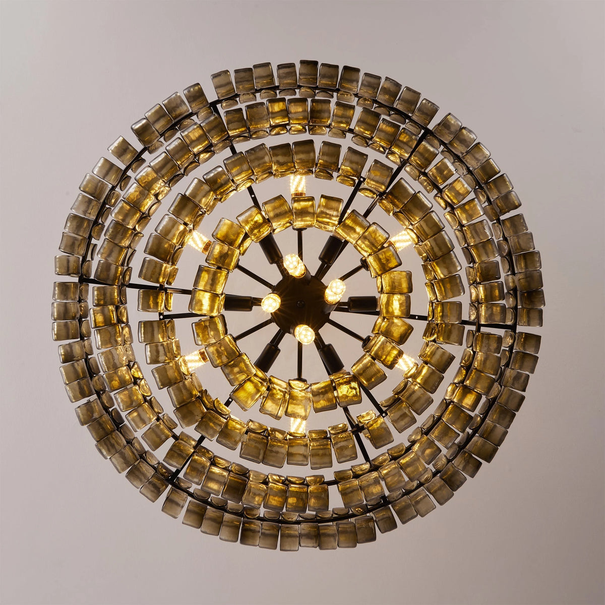 Illuminated Modern Clear Tiered Art Glass Chandelier Studio Shot