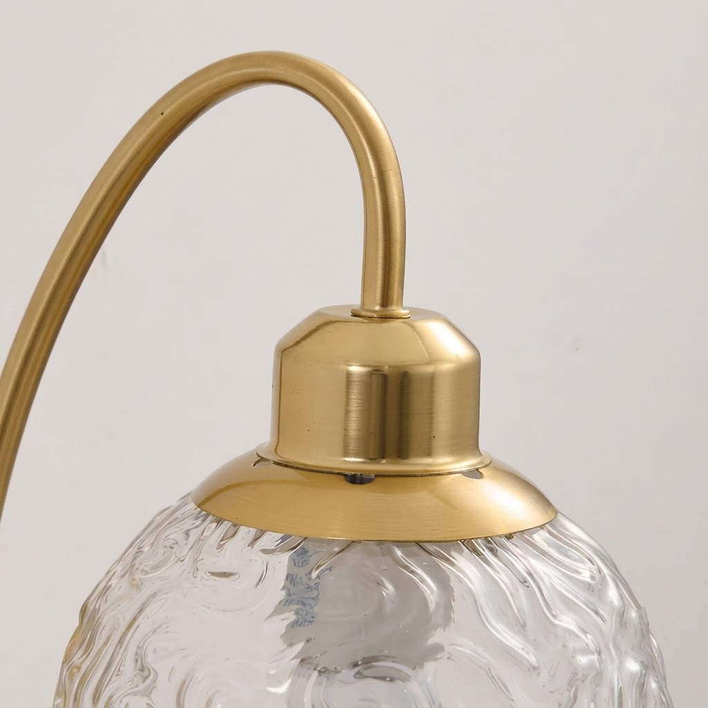 Detail View of Brushed Brass Socket Cap and Gooseneck Arm