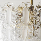 Angled View of Modern Brass Oval Art Glass Semi-Flush Mount Chandelier Studio Display