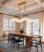 Modern Wave Art Glass Linear Chandelier with Pearl Strand in Cozy Dining Space