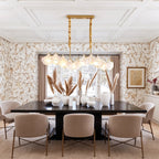 Modern Brass Wave Art Glass Linear Chandelier with Pearls in Elegant Dining Area
