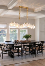 Modern Brass Wave Art Glass Linear Chandelier with Pearls in Formal Dining Room