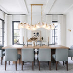 Modern Feather Wave Art Glass Linear Chandelier in Elegant Dining Area