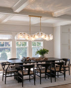 Modern Brass Feather Wave Art Glass Linear Chandelier in Classic Dining Setting