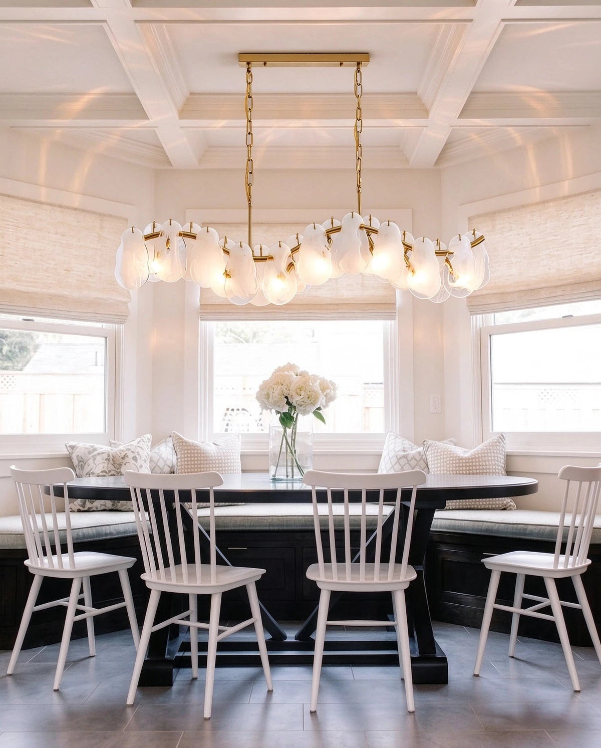 Modern Brass Feather Wave Art Glass Linear Chandelier Over Dining Nook