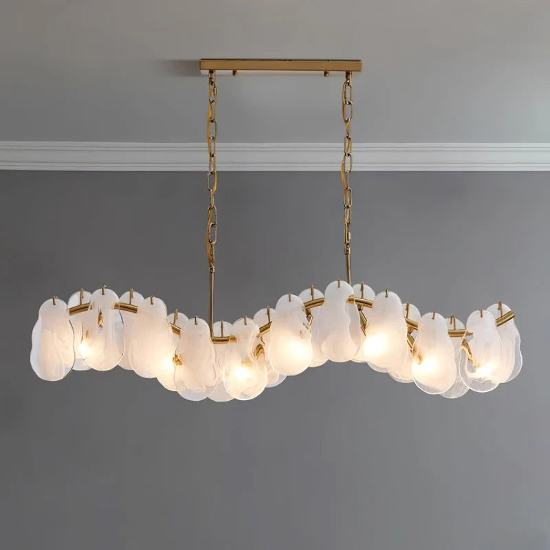 Illuminated Modern Brass Feather Wave Art Glass Linear Chandelier Studio Shot