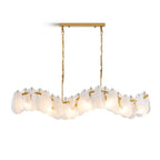 Modern Brass and Wave Art Glass Linear Chandelier with Gold Canopy on Pure White Background