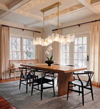Modern Brass Wave Art Glass Linear Chandelier in Bright Dining Room