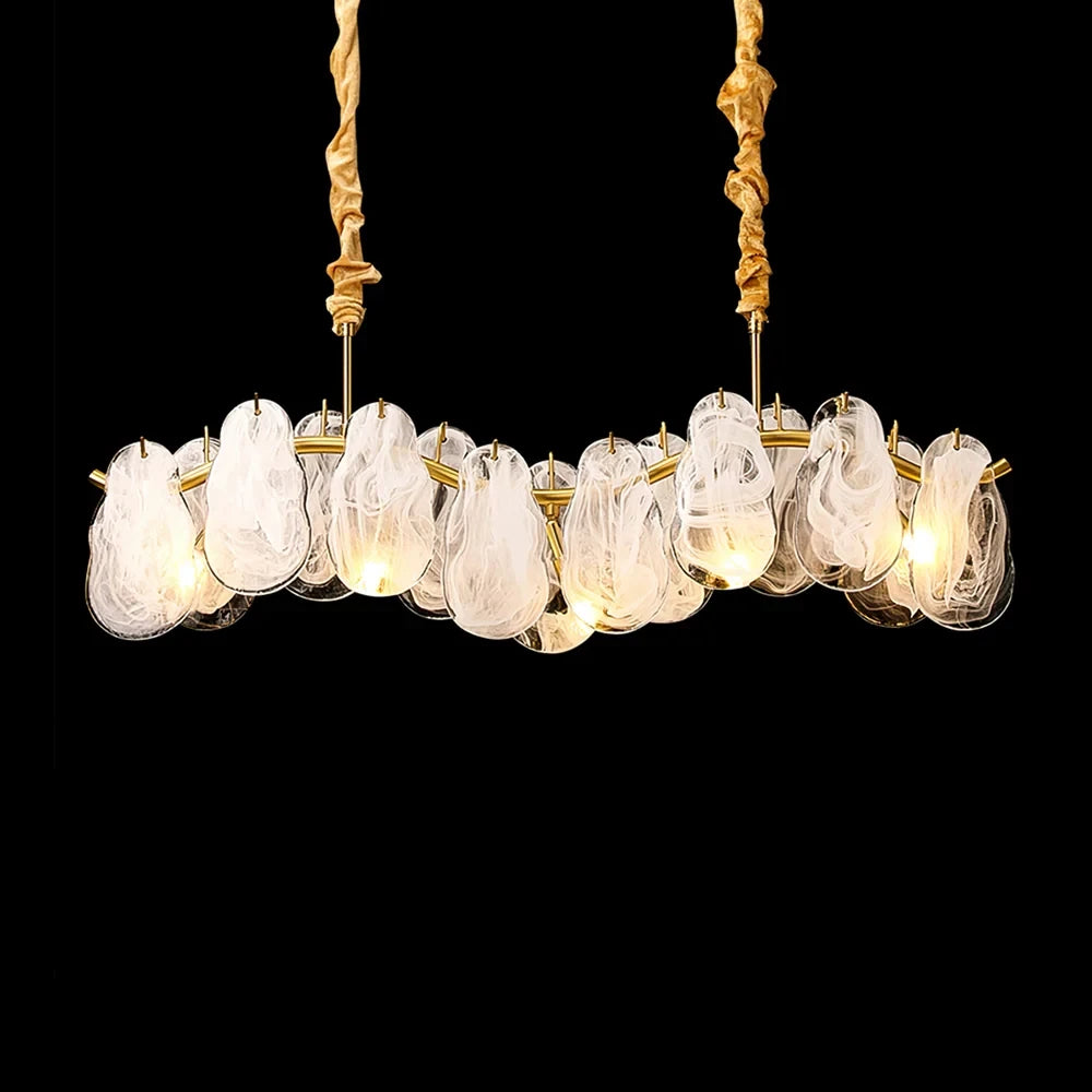 Illuminated Modern Brass Wave Art Glass Linear Chandelier Studio Shot on Dark Background