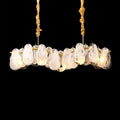 Illuminated Modern Brass Wave Art Glass Linear Chandelier Studio Shot on Dark Background