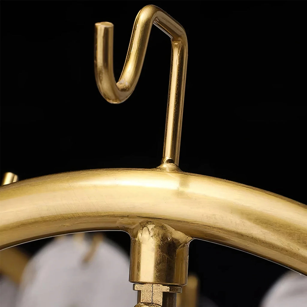 Close Up View of Modern Brass Ceiling Canopy and Hook Connection Details