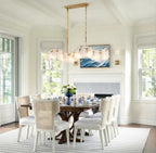 Modern Brass Wave Art Glass Linear Chandelier in Elegant Dining Area