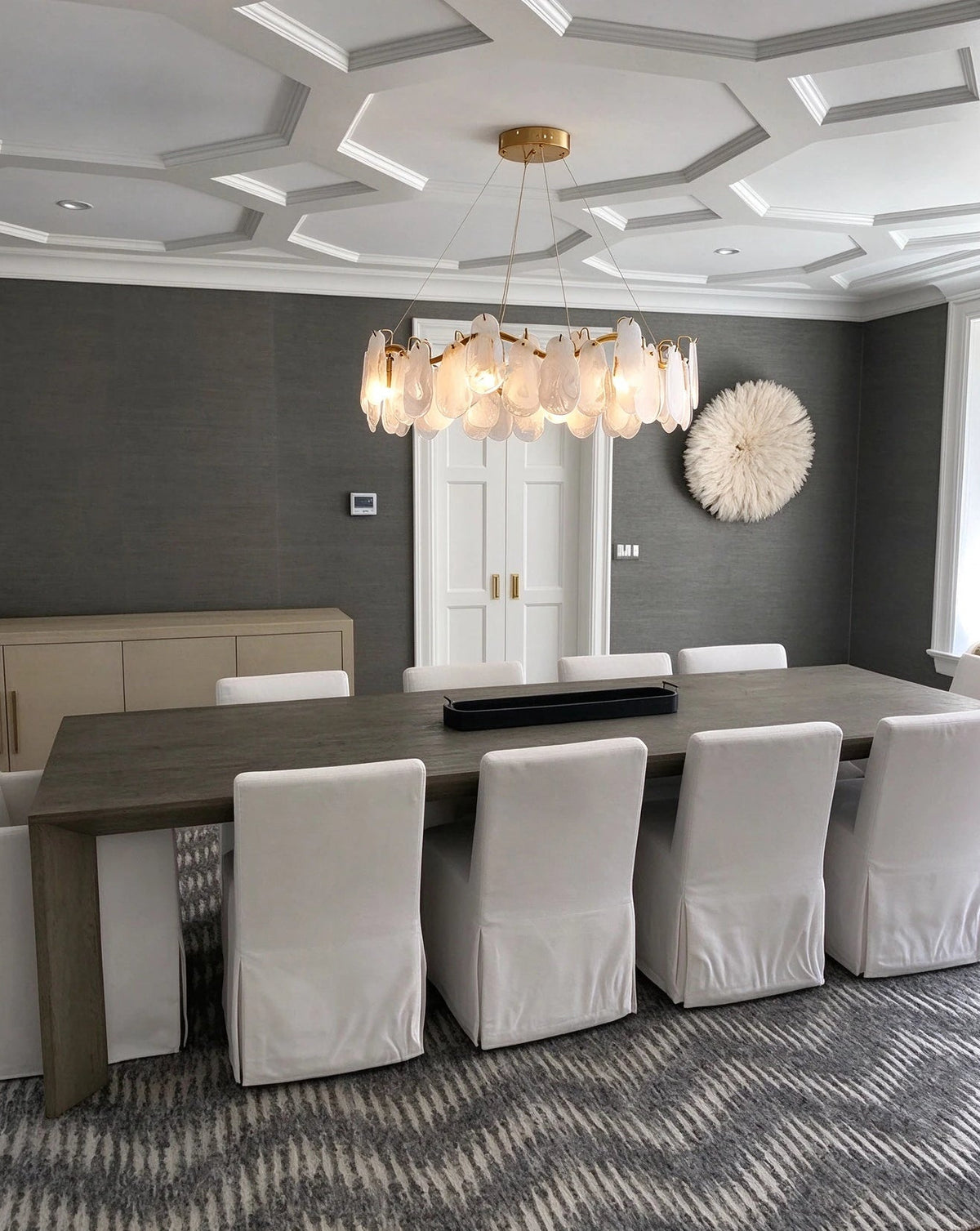Modern Brass Feather Wave Chandelier in Elegant Dining Setting