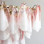 Close Up View of Multi-Tier Pink Petals and Brass Hardware Structure