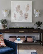 Modern Gradient Petal Wall Sconces Over Credenza and Artwork