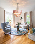 Modern Pink Disc Chandelier in Cozy Sitting Room