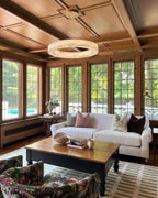 Modern Alabaster Chandelier in Vaulted Ceiling Living Room