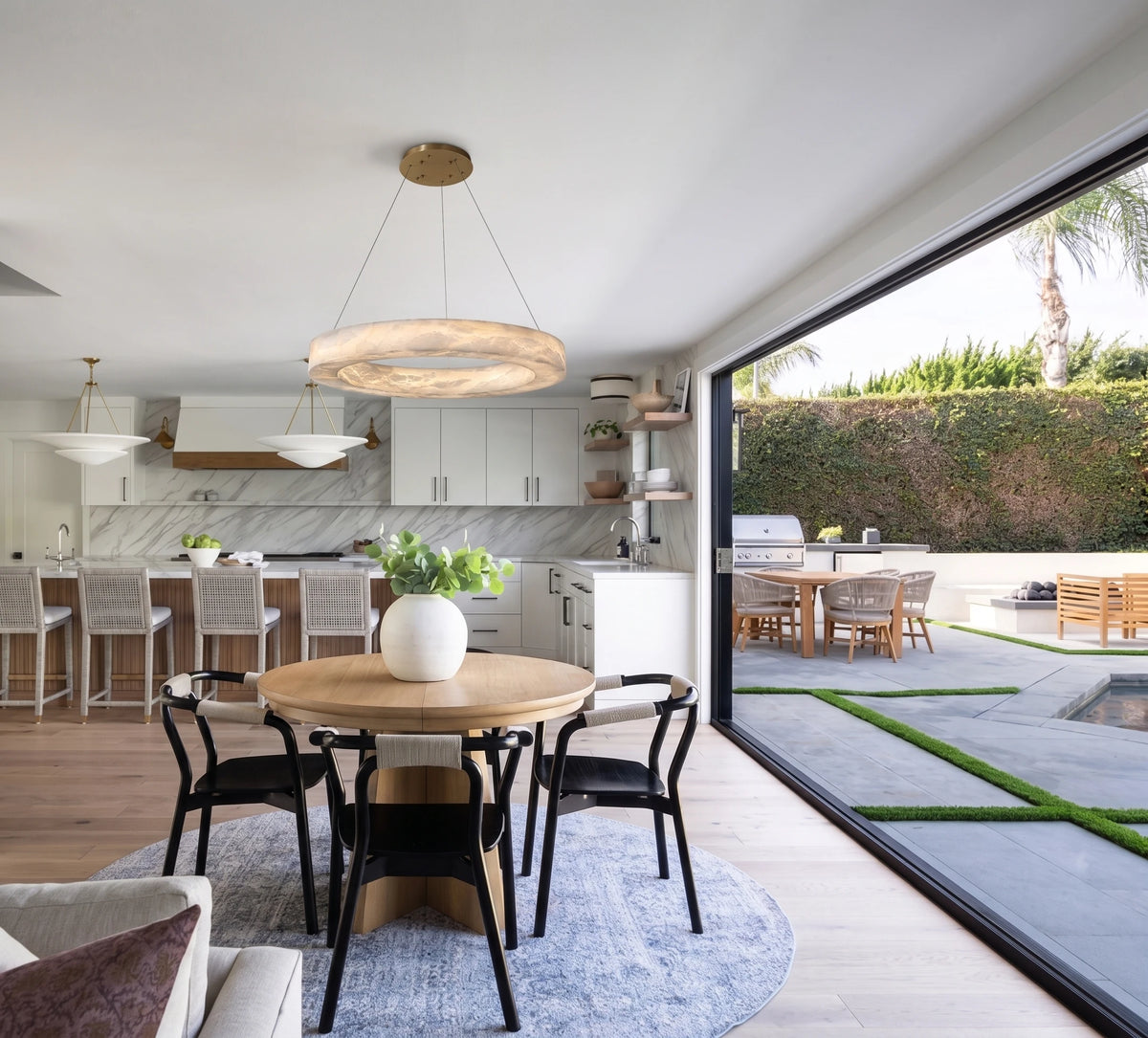 Alabaster Ring Pendant Light Over Round Dining Table