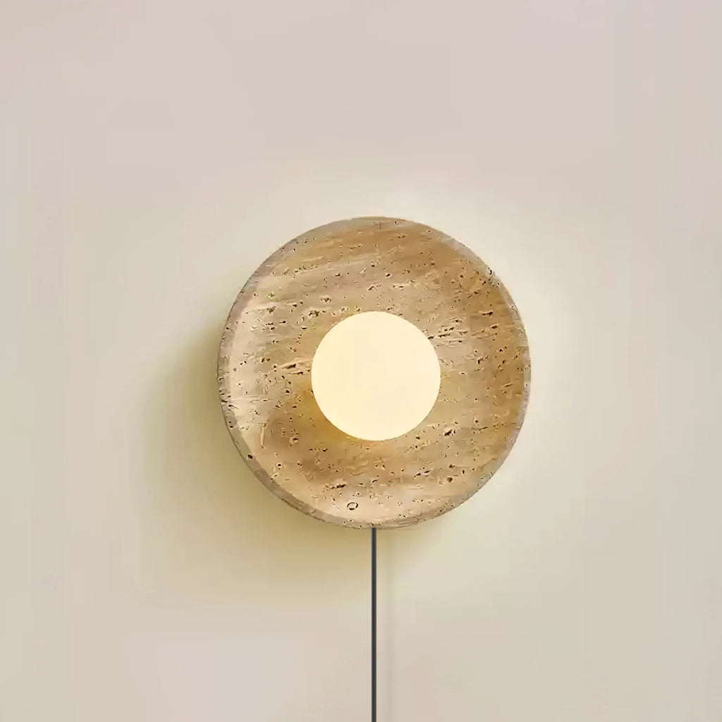 Illuminated Modern Travertine Dish Wall Sconce Studio Shot