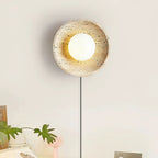 Modern Travertine Dish Wall Sconce in Bedroom Interior