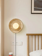 Modern Travertine Dish Wall Sconce in Master Bedroom Setting