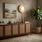 Modern Travertine Dish Wall Sconce Over Living Room Credenza