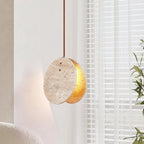 Japandi Travertine Pendant Light Over Living Room Seating Area