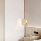 Wabi Sabi Travertine Pendant Light Illuminating Bedroom Nook