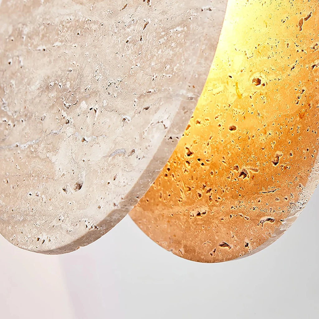 Close Up View of Natural Travertine Disc and Glowing Backplate