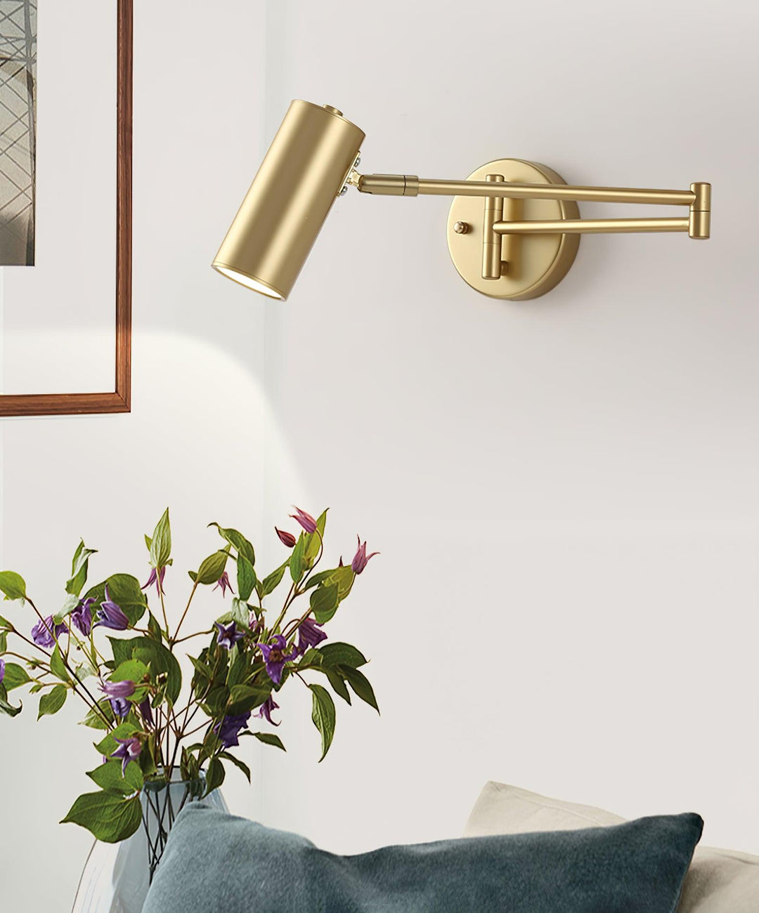 Brass Swing Arm Wall Lamp Over Side Table